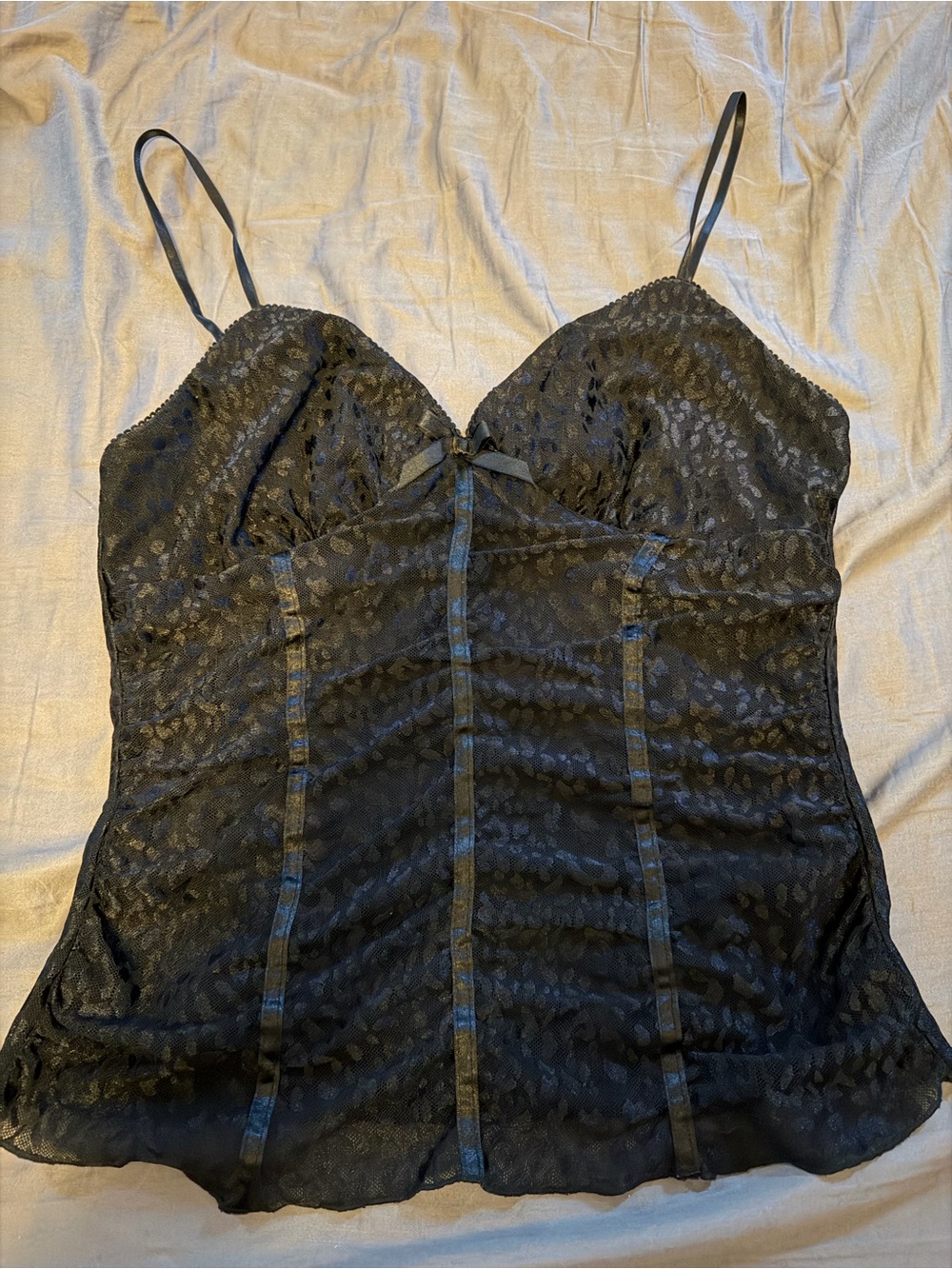 A Byer corset style black lace camisole
Size L